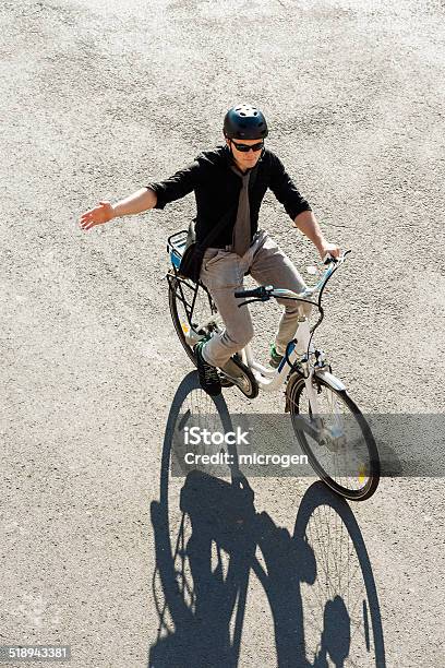 City Ebike Commuter Stock Photo - Download Image Now - Cycling, Bicycle, Hand Sign