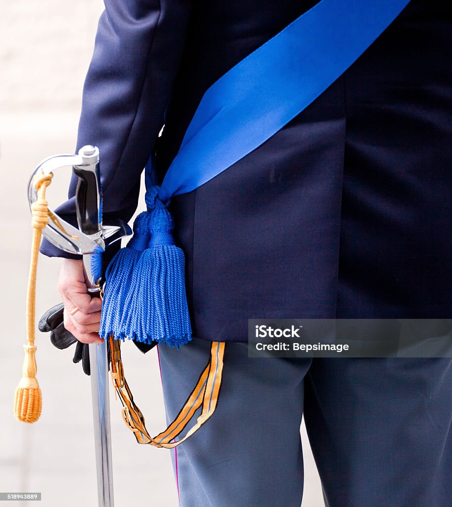 Italian policeman Detail of an italian policeman with a sword - ceremony of the Police in Trieste http://anps-trieste.jimdo.com/manifestazioni-2011/festa-della-polizia/ Army Stock Photo