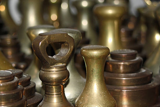istock Close-up of bronze weights 518948035