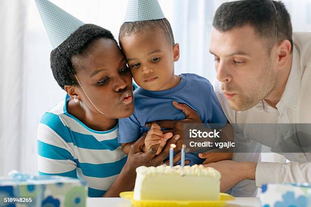 Blowing Candles On Birthday Cake Stock Photo - Download Image Now - Blowing, Boys, Candle