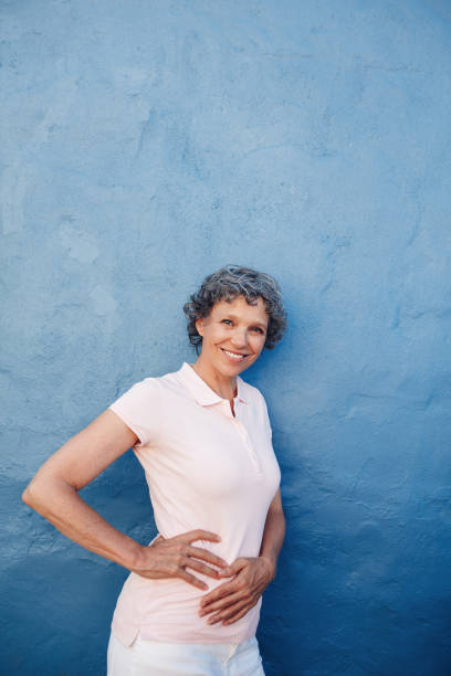 istock Confident mature woman posing to camera 518948806