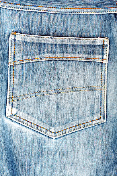 istock Blue jeans back pocket. Beautiful casual style 518948973