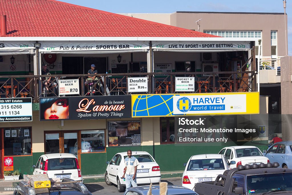 Shelly Beach in KwaZulu-Natal, South Africa Shelly Beach, South Africa - May 19, 2014: A gastro pub and sports bar in Shelly Beach on the South Coast, with several cars and shops visible from the road. Africa Stock Photo