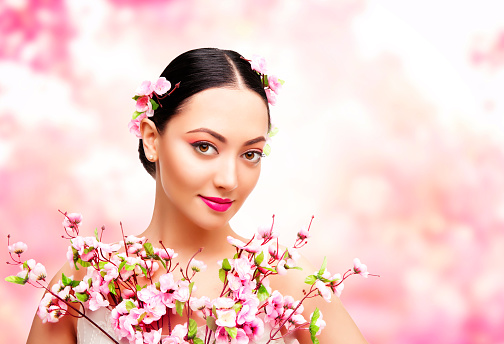 Woman Beauty with Pink Flowers, Beautiful Asian Fashion Model Girl Portrait