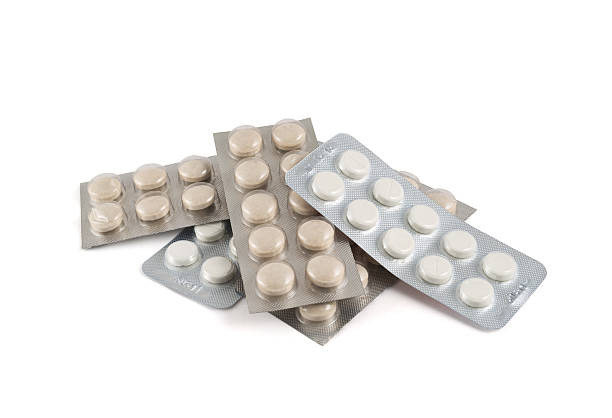 istock Pile of blister bubble pack pills isolated 518952836