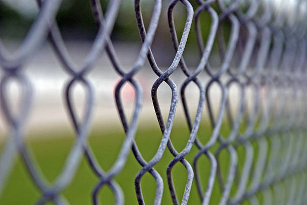istock Chain Link Fence Close Up 518952980