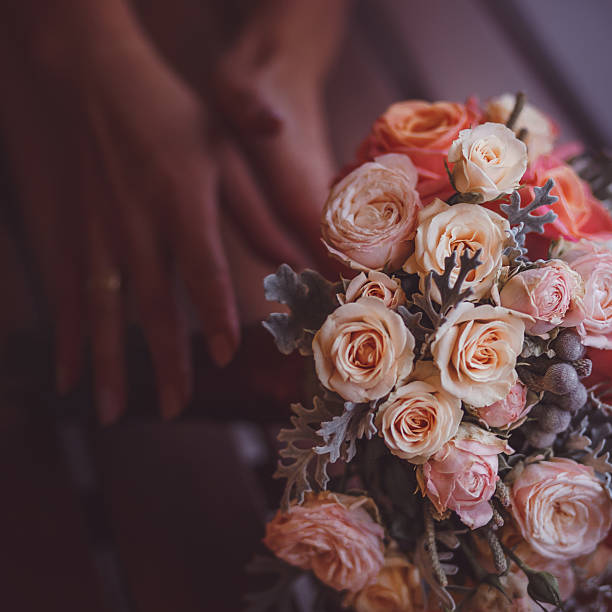 istock Bride holding stylish wedding bouquet 518955664