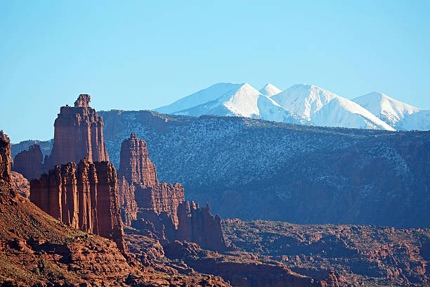 Fisher Towers and La Sal Mountains Landscape from scenic road 128 in Utah la sal mountains stock pictures, royalty-free photos & images