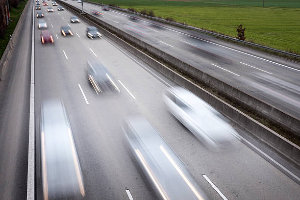 istock Highway German autobahn high-angle view motion blur 518963354