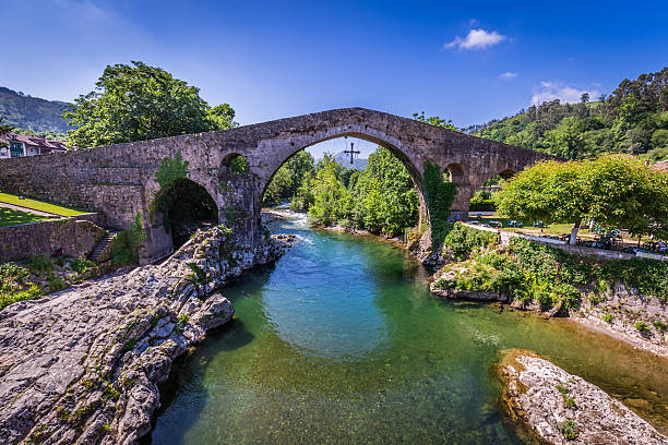 istock Old Roman stone bridge in Cangas de Onis (Asturias), Spain 518964102