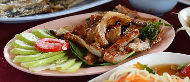 Fry the pork in the dish close stock photo