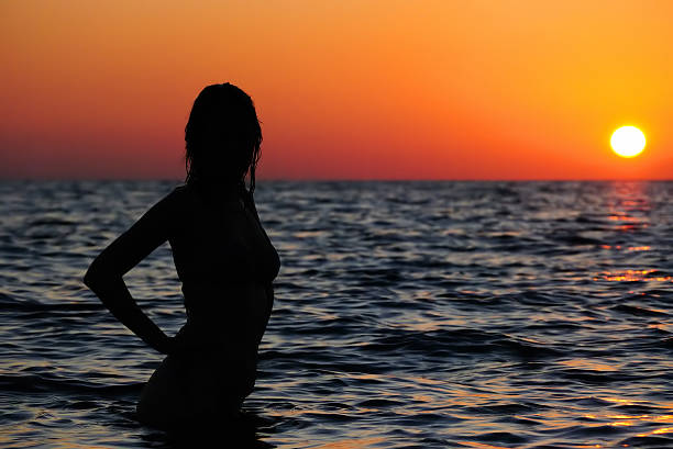 istock Young girl in the sea 518976405