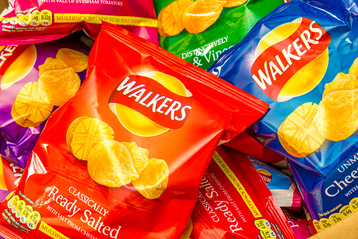 Leicester, England - October 16, 2014: Close up of a group of different bags of Walker's Crisps.