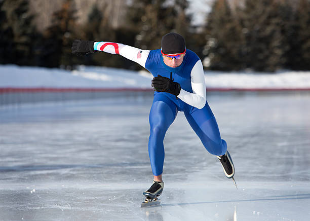 istock Male Athlete Speed Skating on a Cold Winter Day. 518977013