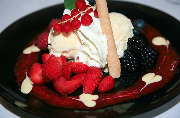istock Ice cream sundae with fresh fruits and wafer 518977481