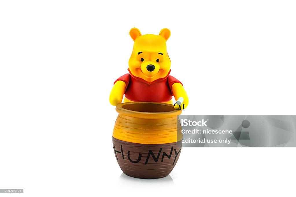 Figure Of Winnie The Pooh And Hunny Pot Stock Photo - Download