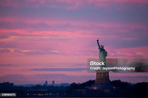 Statue Of Liberty At Dusk Stock Photo - Download Image Now - American Culture, Atmospheric Mood, Back Lit