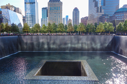 New York, USA - September 23, 2014: National September 11 Memorial is an educational and historical institution honoring the victims of the Twin Towers attack