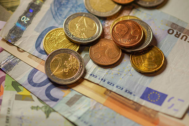 Euro coins and banknotes money.