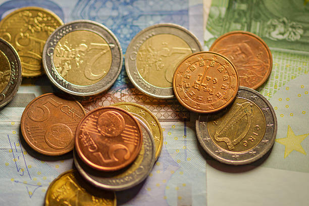 istock Euro coins and banknotes money. 518982991