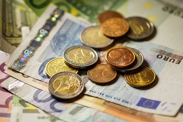 istock Euro coins and banknotes money. 518983003
