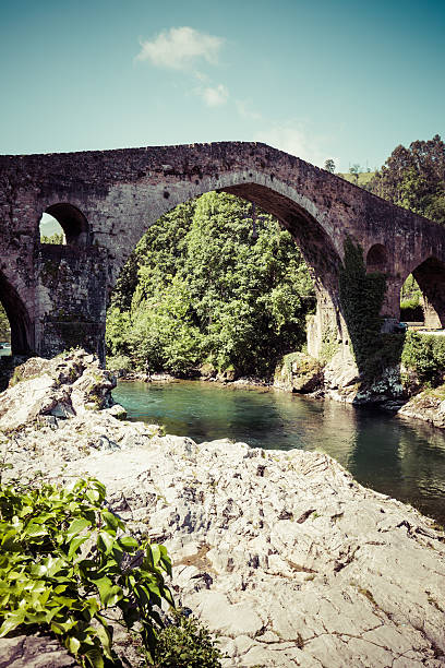 istock Old Roman stone bridge in Cangas de Onis (Asturias), Spain 518999322