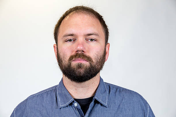 istock Man in Mid 30s Poses for Studio Portrait 519001338