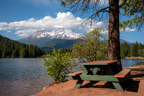 Beautiful picnic site by Siskiyou Lake with a view of Mount Shasta. Southern Cascades. Northern California.