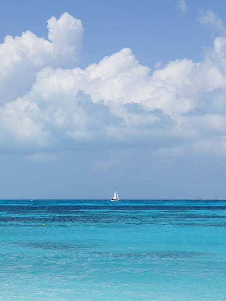 istock White Sailboat on the Beautiful Blue Sea 519007638