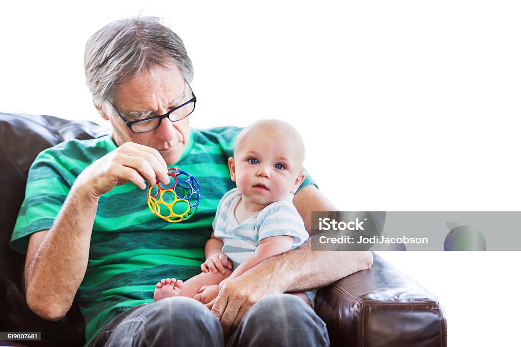 Grandfather holding his baby grandson Grandfather is holding his four month old baby grandson on his lap.  rm Baby - Human Age Stock Photo