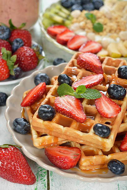 istock Waffles with berries and caramel sauce 519008700