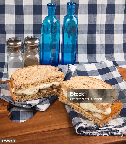 Fresh Fish Finger Sandwich On Wholegrain In Kitchen Setting Stock Photo - Download Image Now