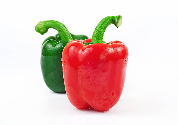 istock two wet sweet red and green peppers 519011036