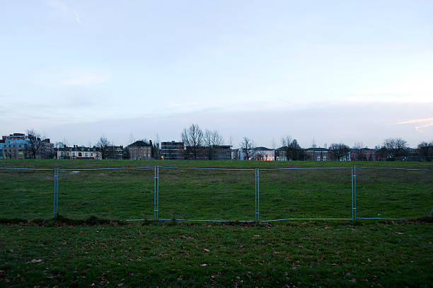 istock Fence and residental buildings 519011363