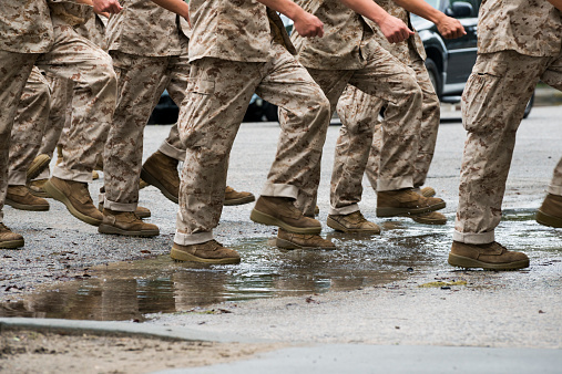 US Marine Corps recruits march in formation at Parris Island, South Carolina