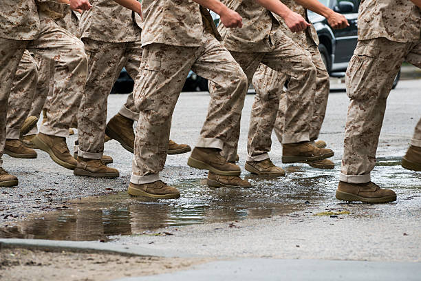 U.S. Marine Corps training - Parris Island, South Carolina US Marine Corps recruits march in formation at Parris Island, South Carolina military recruit stock pictures, royalty-free photos & images