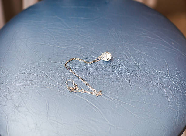 istock Silver jewelry chain with pendant 519013250