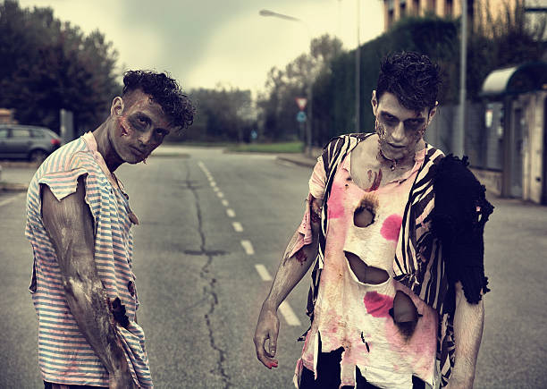 istock Two male zombies standing in empty city street 519013819