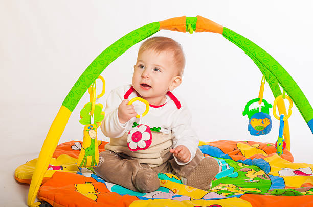 istock Baby boy playing with toys 519025037