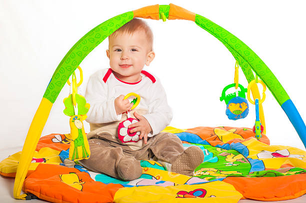 istock Baby boy playing with toys 519025041