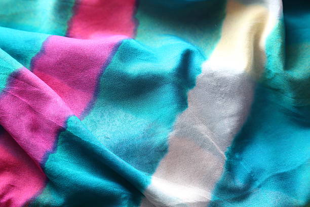 istock Indian bandhej saree cloth fabric texture 519025503