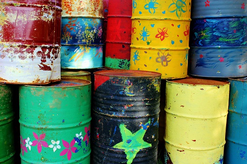 Highly coloured 50 gallon drums. These drums were left over from Glastonbury festival.