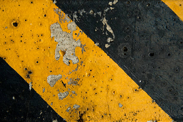 istock Black and yellow grunge background. 519026461