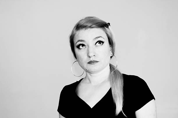 istock Blond woman looking up 519029777