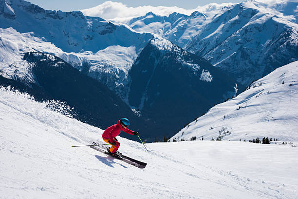 istock Female athlete skiing in the mountains 519037012