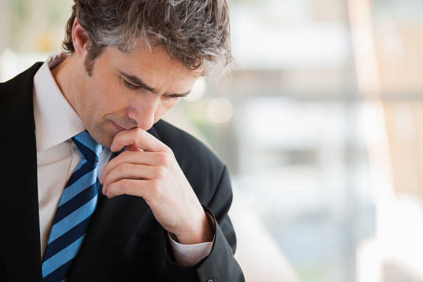 Businessman thinking Businessman thinking man regret stock pictures, royalty-free photos & images