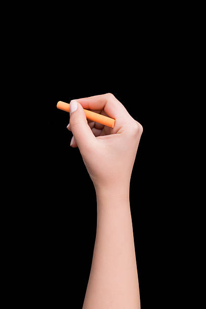 istock Hand writing on chalkboard with orange chalk 519043506