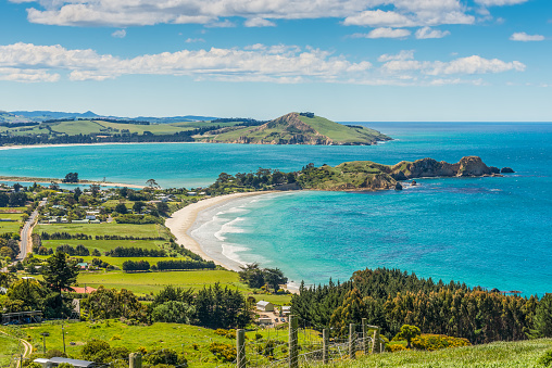 Karitane coastline, Huriawa Peninsula in the center (Historic Maori Pa Site), Karitane near Dunedin Otago South Island New Zealand