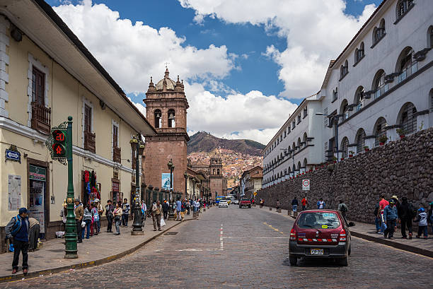 Cusco, Peru - September 3, 2015: People and tourists walking in the streets of Cusco, former Inca capital, famous travel destination in Peru and one of the most visited historical cities in the world.