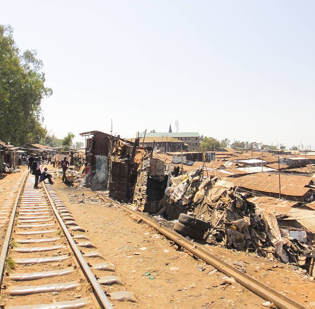 Kibera slum - the largest slum in Kenya and Africa Kibera slum - the largest slum in Kenya and Africa. Nairobi xxi stock pictures, royalty-free photos & images